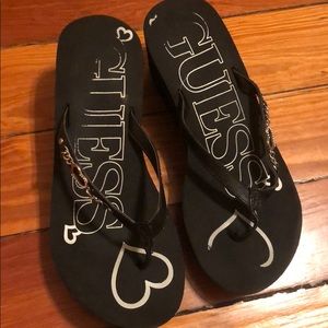 Guess platform flip flops